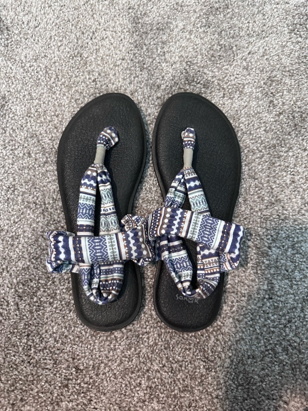 Sanuk Black Footbed Sandals with Navy & White Patterned Straps